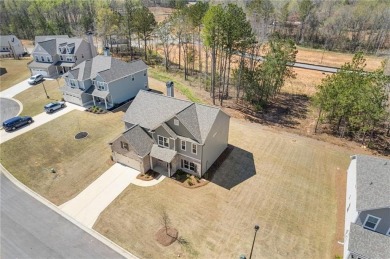 Live the Resort Lifestyle in the Stunning Southport Model by on Traditions of Braselton Golf Club in Georgia - for sale on GolfHomes.com, golf home, golf lot