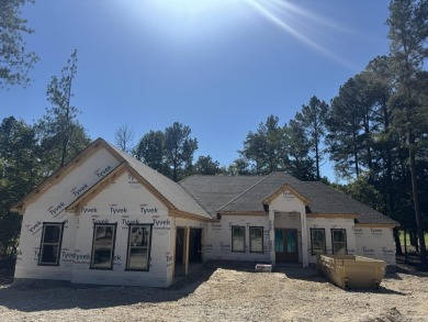Beautiful 3-bedroom, 3-bath home with a 3-car garage located on on Granada Golf Course in Arkansas - for sale on GolfHomes.com, golf home, golf lot