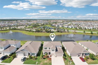 Stunning 4-Bedroom Pond View Home in Gated Star Farms at on Esplanade Golf and Country at Lakewood Ranch in Florida - for sale on GolfHomes.com, golf home, golf lot