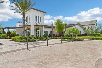Stunning 4-Bedroom Pond View Home in Gated Star Farms at on Esplanade Golf and Country at Lakewood Ranch in Florida - for sale on GolfHomes.com, golf home, golf lot