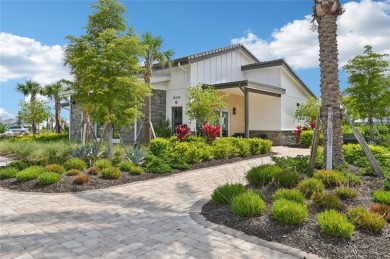 Stunning 4-Bedroom Pond View Home in Gated Star Farms at on Esplanade Golf and Country at Lakewood Ranch in Florida - for sale on GolfHomes.com, golf home, golf lot