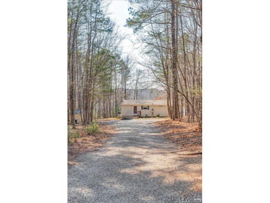 Enjoy peaceful, secluded waterfront living at 2407 Great Creek on Tanglewood Shores Golf Club in Virginia - for sale on GolfHomes.com, golf home, golf lot