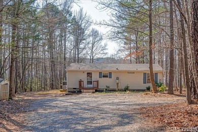 Enjoy peaceful, secluded waterfront living at 2407 Great Creek on Tanglewood Shores Golf Club in Virginia - for sale on GolfHomes.com, golf home, golf lot
