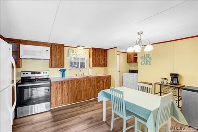 Enjoy peaceful, secluded waterfront living at 2407 Great Creek on Tanglewood Shores Golf Club in Virginia - for sale on GolfHomes.com, golf home, golf lot