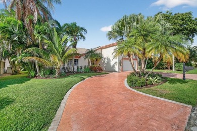 Welcome to this exceptional residence where charm, comfort, and on Woodmont Country Club in Florida - for sale on GolfHomes.com, golf home, golf lot