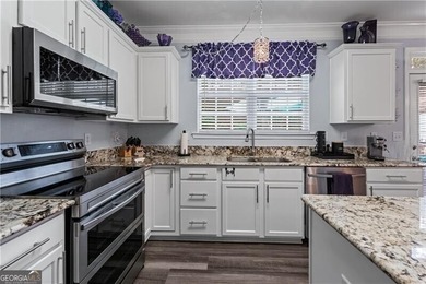 LOCATION! LOCATION! LOCATION!  This beautifully maintained home on Collins Hill Golf Club in Georgia - for sale on GolfHomes.com, golf home, golf lot