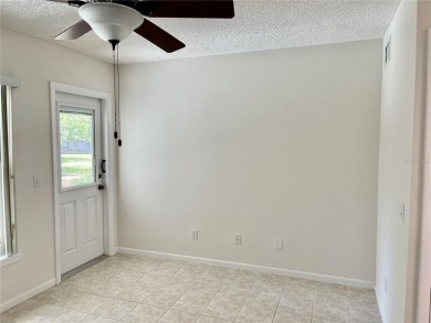 GROUND FLOOR 2 bedroom/2 bath condo on WEST side of Belcher that on On Top Of The World Golf Course in Florida - for sale on GolfHomes.com, golf home, golf lot