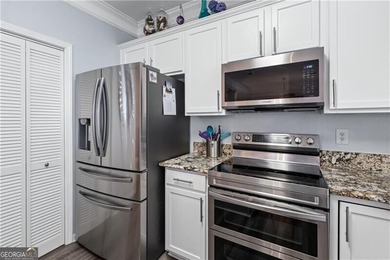 LOCATION! LOCATION! LOCATION!  This beautifully maintained home on Collins Hill Golf Club in Georgia - for sale on GolfHomes.com, golf home, golf lot