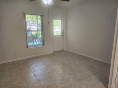 GROUND FLOOR 2 bedroom/2 bath condo on WEST side of Belcher that on On Top Of The World Golf Course in Florida - for sale on GolfHomes.com, golf home, golf lot