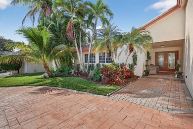 Welcome to this exceptional residence where charm, comfort, and on Woodmont Country Club in Florida - for sale on GolfHomes.com, golf home, golf lot