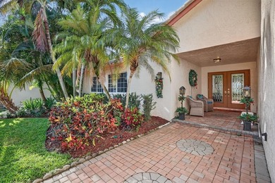 Welcome to this exceptional residence where charm, comfort, and on Woodmont Country Club in Florida - for sale on GolfHomes.com, golf home, golf lot