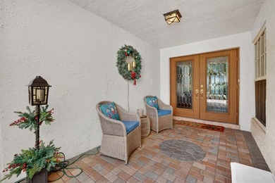 Welcome to this exceptional residence where charm, comfort, and on Woodmont Country Club in Florida - for sale on GolfHomes.com, golf home, golf lot