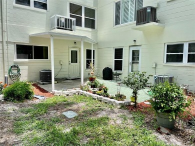 GROUND FLOOR 2 bedroom/2 bath condo on WEST side of Belcher that on On Top Of The World Golf Course in Florida - for sale on GolfHomes.com, golf home, golf lot