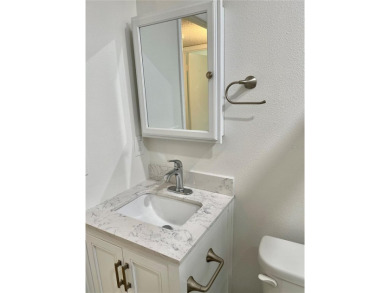 GROUND FLOOR 2 bedroom/2 bath condo on WEST side of Belcher that on On Top Of The World Golf Course in Florida - for sale on GolfHomes.com, golf home, golf lot