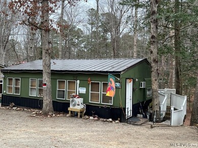 Large 2 lot, 2 bedroom, 1 bath home. Large back deck for on River Ridge Golf Club in Virginia - for sale on GolfHomes.com, golf home, golf lot
