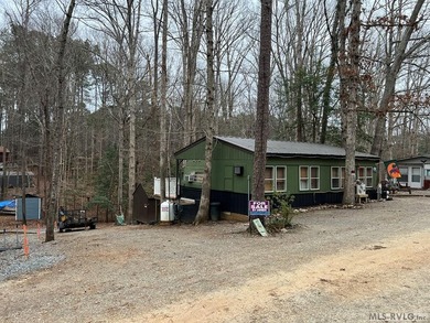 Large 2 lot, 2 bedroom, 1 bath home. Large back deck for on River Ridge Golf Club in Virginia - for sale on GolfHomes.com, golf home, golf lot