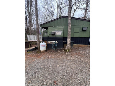 Large 2 lot, 2 bedroom, 1 bath home. Large back deck for on River Ridge Golf Club in Virginia - for sale on GolfHomes.com, golf home, golf lot