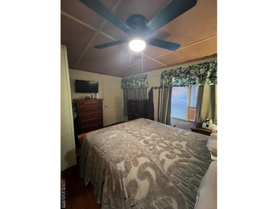 Large 2 lot, 2 bedroom, 1 bath home. Large back deck for on River Ridge Golf Club in Virginia - for sale on GolfHomes.com, golf home, golf lot