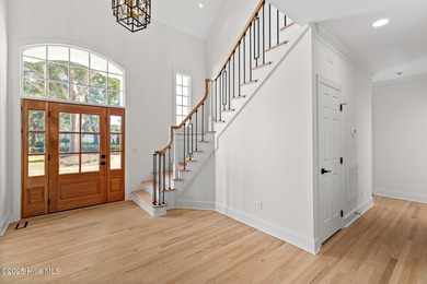 This beautifully renovated home sits along the Ocean #5 fairway on Country Club of Landfall in North Carolina - for sale on GolfHomes.com, golf home, golf lot