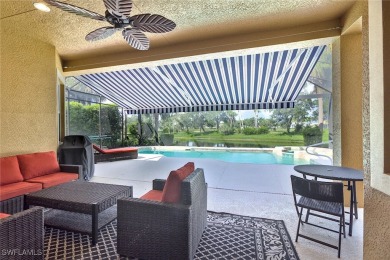 Step inside to a beautifully FURNISHED and updated interior on Shadow Wood Preserve in Florida - for sale on GolfHomes.com, golf home, golf lot