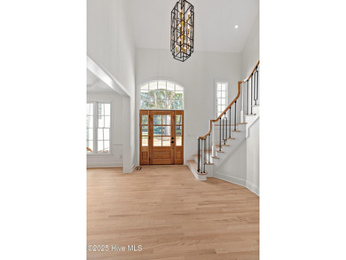 This beautifully renovated home sits along the Ocean #5 fairway on Country Club of Landfall in North Carolina - for sale on GolfHomes.com, golf home, golf lot