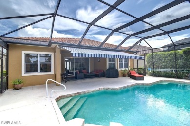 Step inside to a beautifully FURNISHED and updated interior on Shadow Wood Preserve in Florida - for sale on GolfHomes.com, golf home, golf lot