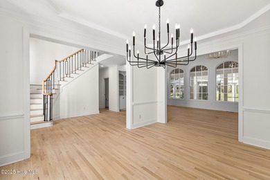 This beautifully renovated home sits along the Ocean #5 fairway on Country Club of Landfall in North Carolina - for sale on GolfHomes.com, golf home, golf lot