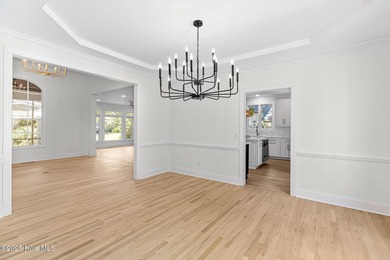 This beautifully renovated home sits along the Ocean #5 fairway on Country Club of Landfall in North Carolina - for sale on GolfHomes.com, golf home, golf lot