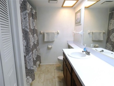 Come home every evening, relax on your screen enclosed oversized on East Lake Woodlands Country Club in Florida - for sale on GolfHomes.com, golf home, golf lot