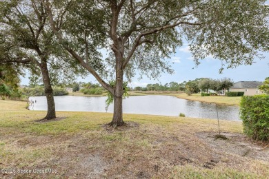 Nestled in the sought-after gated community of Fairway Crossings on Majors Golf Club At Bayside Lakes in Florida - for sale on GolfHomes.com, golf home, golf lot