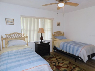 Come home every evening, relax on your screen enclosed oversized on East Lake Woodlands Country Club in Florida - for sale on GolfHomes.com, golf home, golf lot