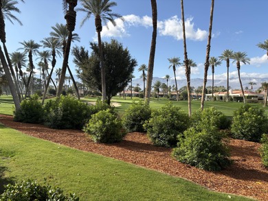 Popular Doral plan home overlooking the 13th fairway and green on Desert Horizons Country Club in California - for sale on GolfHomes.com, golf home, golf lot