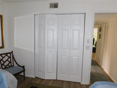 Come home every evening, relax on your screen enclosed oversized on East Lake Woodlands Country Club in Florida - for sale on GolfHomes.com, golf home, golf lot