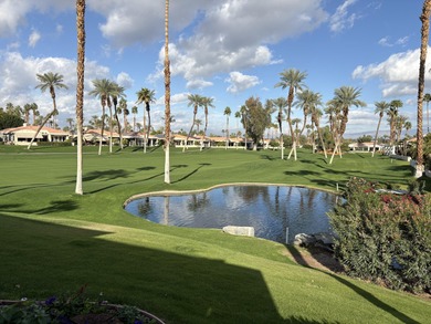 Popular Doral plan home overlooking the 13th fairway and green on Desert Horizons Country Club in California - for sale on GolfHomes.com, golf home, golf lot