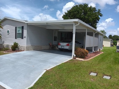 Well maintained 3 bedroom/2bath 2001 Home of Merit home located on Four Lakes Golf Club in Florida - for sale on GolfHomes.com, golf home, golf lot