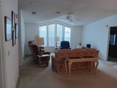 Well maintained 3 bedroom/2bath 2001 Home of Merit home located on Four Lakes Golf Club in Florida - for sale on GolfHomes.com, golf home, golf lot