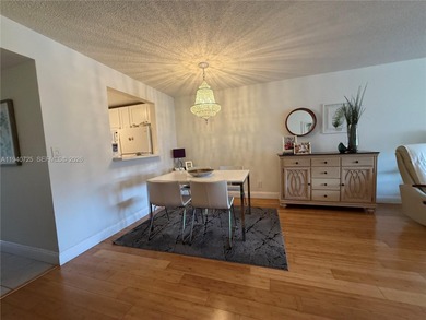 One bedroom one and a half bedroom condo in resort like + on Sunrise Lakes Phase III in Florida - for sale on GolfHomes.com, golf home, golf lot