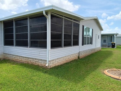 Well maintained 3 bedroom/2bath 2001 Home of Merit home located on Four Lakes Golf Club in Florida - for sale on GolfHomes.com, golf home, golf lot