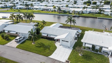 Nestled along a navigable 15+ mile waterway stretching from on Leisureville Community Golf Course in Florida - for sale on GolfHomes.com, golf home, golf lot