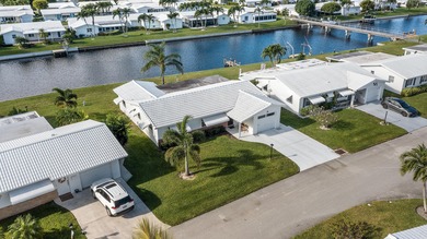 Nestled along a navigable 15+ mile waterway stretching from on Leisureville Community Golf Course in Florida - for sale on GolfHomes.com, golf home, golf lot