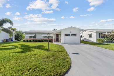 Nestled along a navigable 15+ mile waterway stretching from on Leisureville Community Golf Course in Florida - for sale on GolfHomes.com, golf home, golf lot