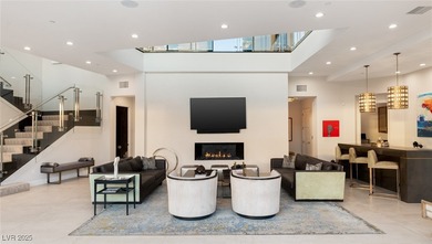 Showcasing over $1M in renovations, 569 Lairmont Place is a on Dragon Ridge Country Club in Nevada - for sale on GolfHomes.com, golf home, golf lot