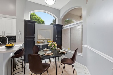 Enjoy relaxed South Florida living in this inviting 3-bedroom on Boca Delray Golf and Country Club in Florida - for sale on GolfHomes.com, golf home, golf lot