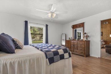 Nestled in Nature's Embrace, this enchanting 3br, 2ba haven on Rayburn Country Club in Texas - for sale on GolfHomes.com, golf home, golf lot