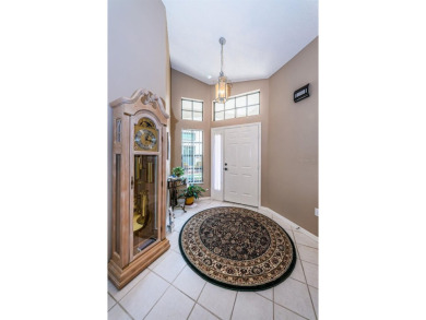 Welcome to your perfect retreat at 9636 Brookdale Dr., located on Timber Greens Country Club in Florida - for sale on GolfHomes.com, golf home, golf lot