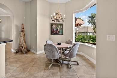 Lakefront and beautifully crafted, this custom-built home sits on Imperial Golf Club in Florida - for sale on GolfHomes.com, golf home, golf lot