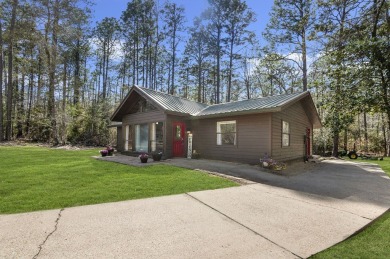 Nestled in Nature's Embrace, this enchanting 3br, 2ba haven on Rayburn Country Club in Texas - for sale on GolfHomes.com, golf home, golf lot