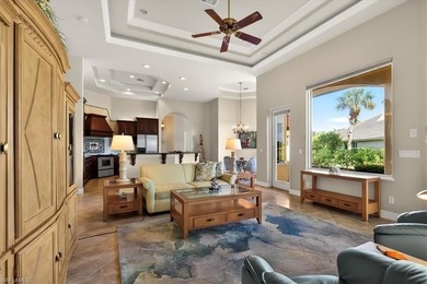 Lakefront and beautifully crafted, this custom-built home sits on Imperial Golf Club in Florida - for sale on GolfHomes.com, golf home, golf lot