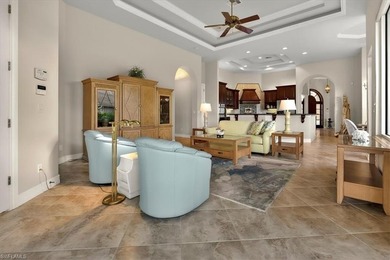 Lakefront and beautifully crafted, this custom-built home sits on Imperial Golf Club in Florida - for sale on GolfHomes.com, golf home, golf lot