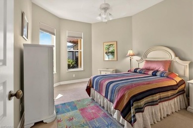 Lakefront and beautifully crafted, this custom-built home sits on Imperial Golf Club in Florida - for sale on GolfHomes.com, golf home, golf lot